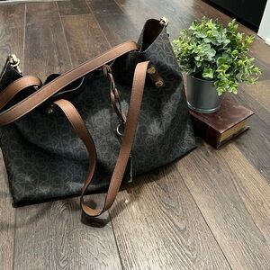 Calvin Klein Brown and Black Designer Tote Bag with matching pouch included.